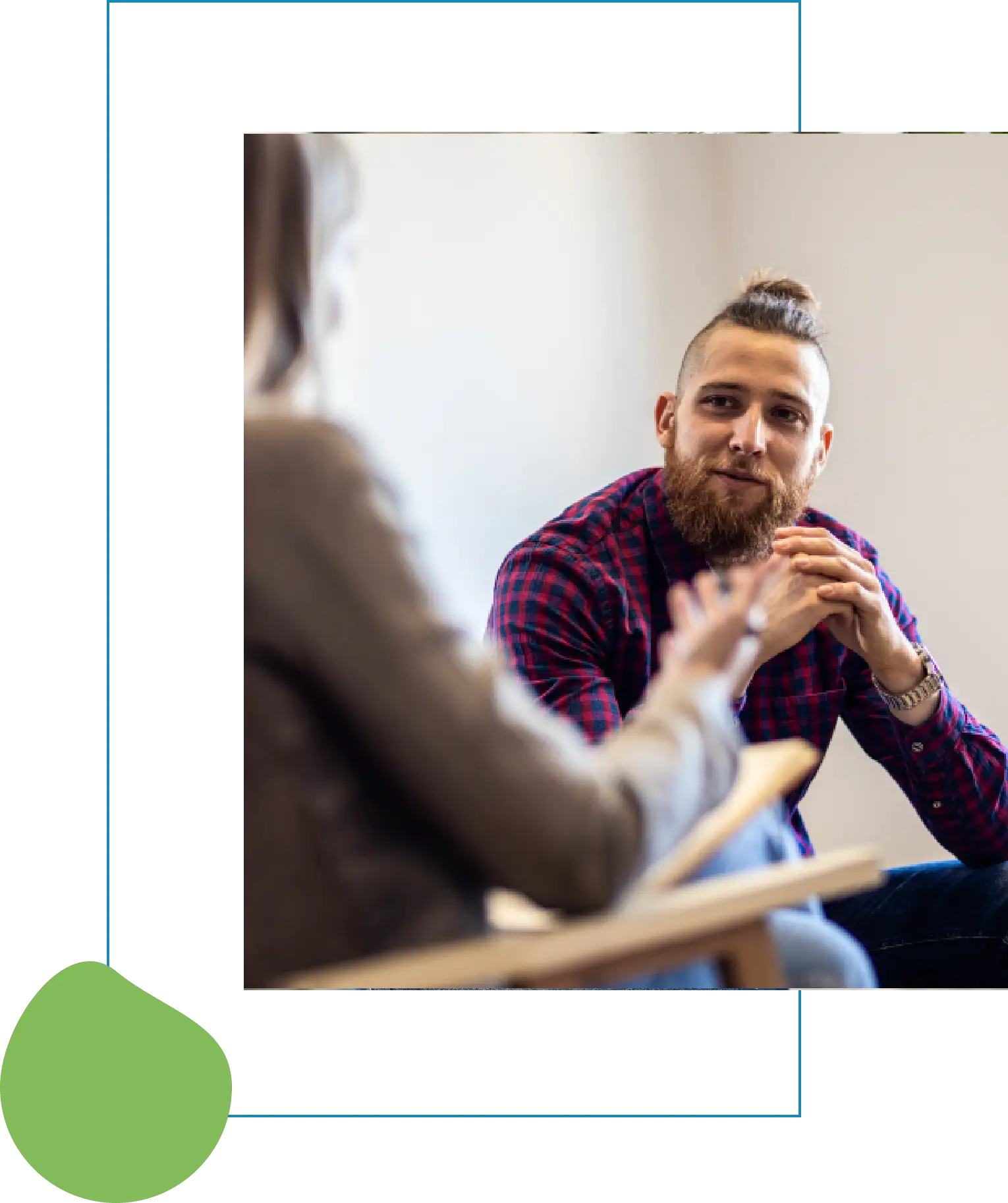 Bearded man attentively listening during counseling